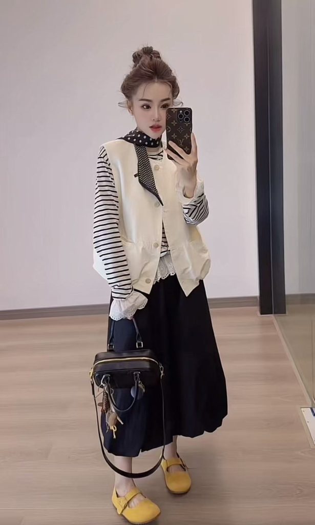 Autumn Three-Piece Set: Striped Long-Sleeve Top, Off-White Vest, and Black Loose Skirt